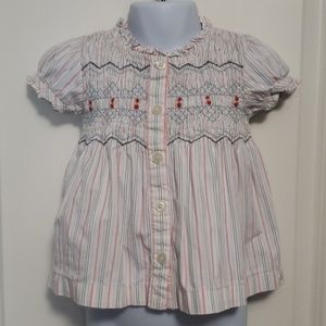 Striped and smocked blouse